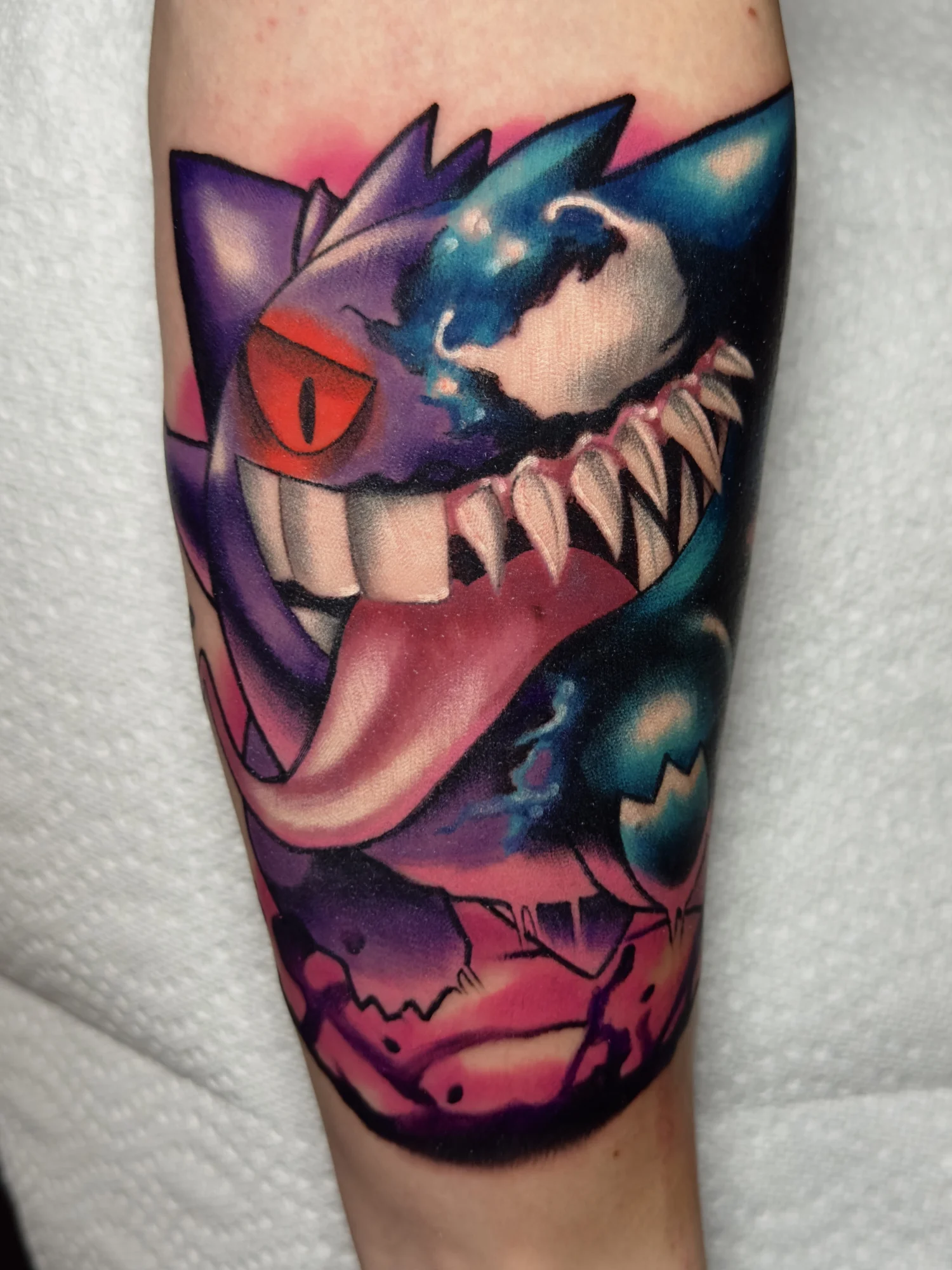 Gengar and Venom mashup tattoo from Pokemon and Spiderman.